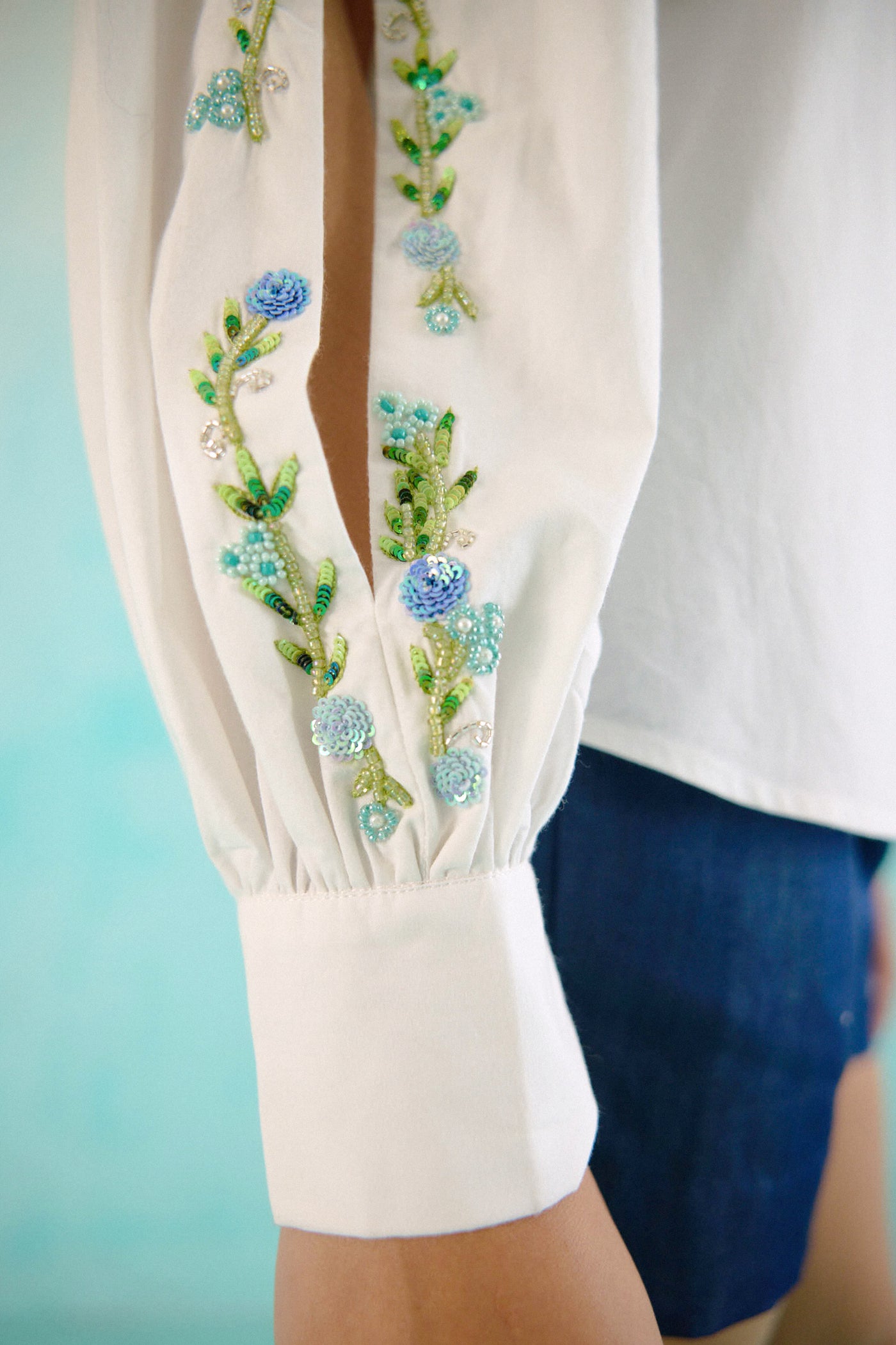 White hand embroidered blue sequins upbeat shirt